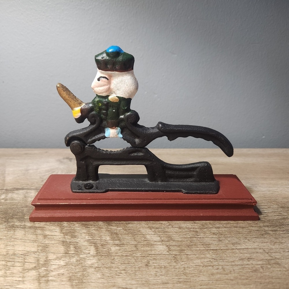 Vintage Cast Iron Scottish Highlander Nutcracker on Wood Base Hand Painted